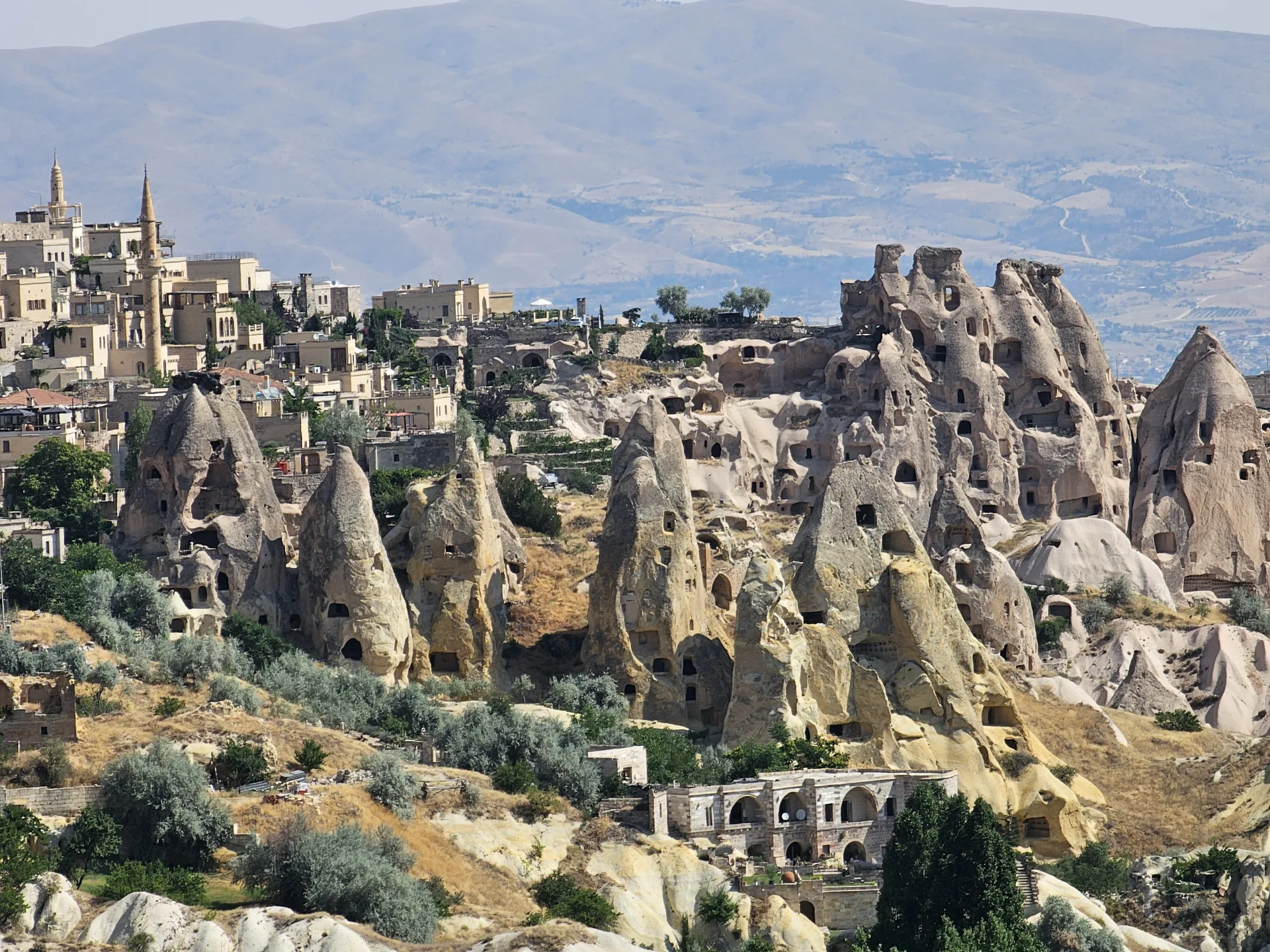 Cappadocia’s rock-cut dwellings and clustered fairy chimneys