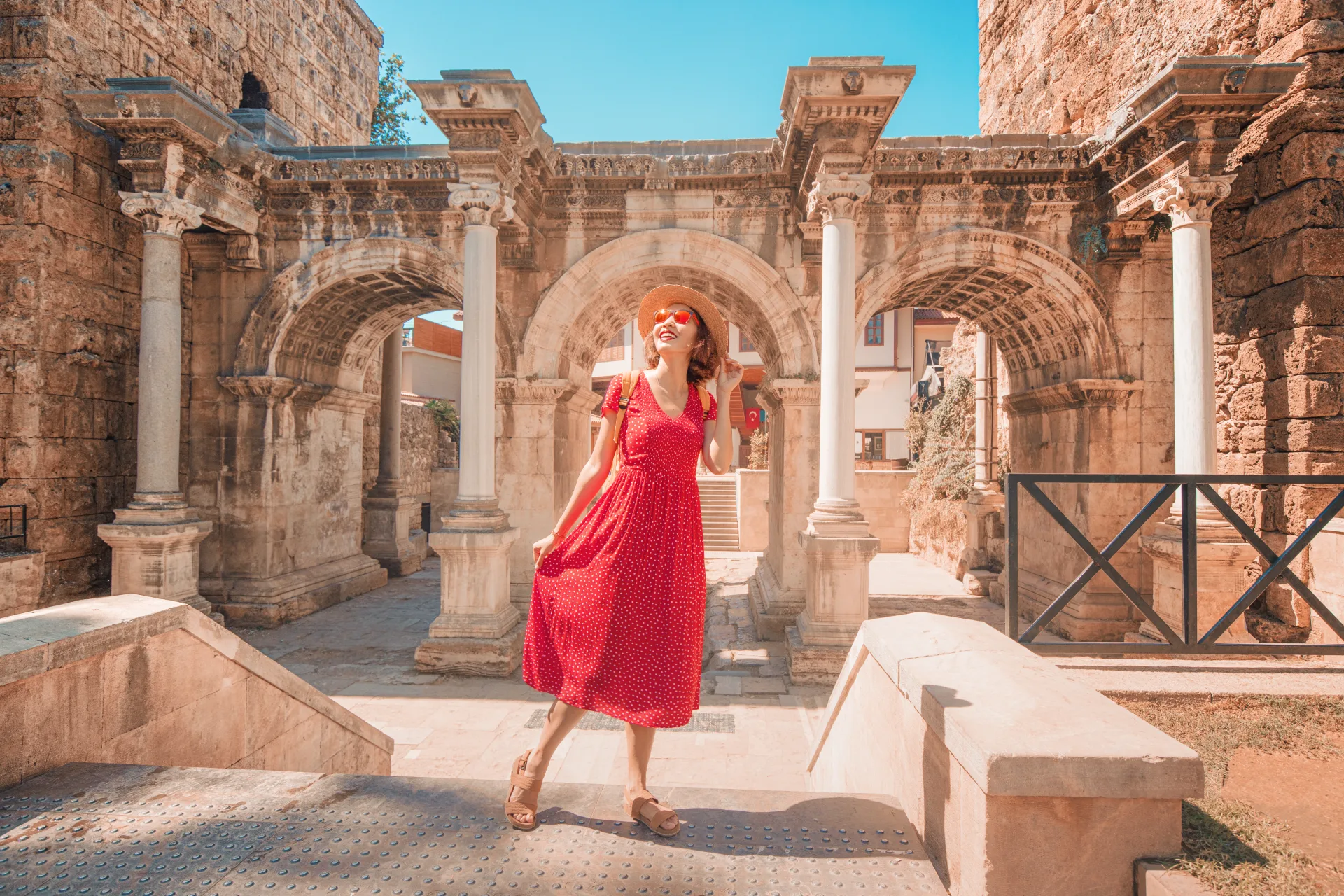 A traveller beside Hadrian’s Gate in Antalya