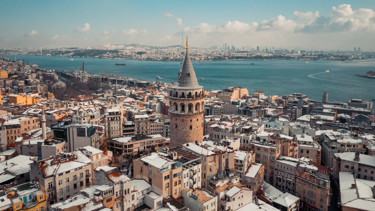 Galata Tower above Istanbul’s roofs with the Bosphorus beyond