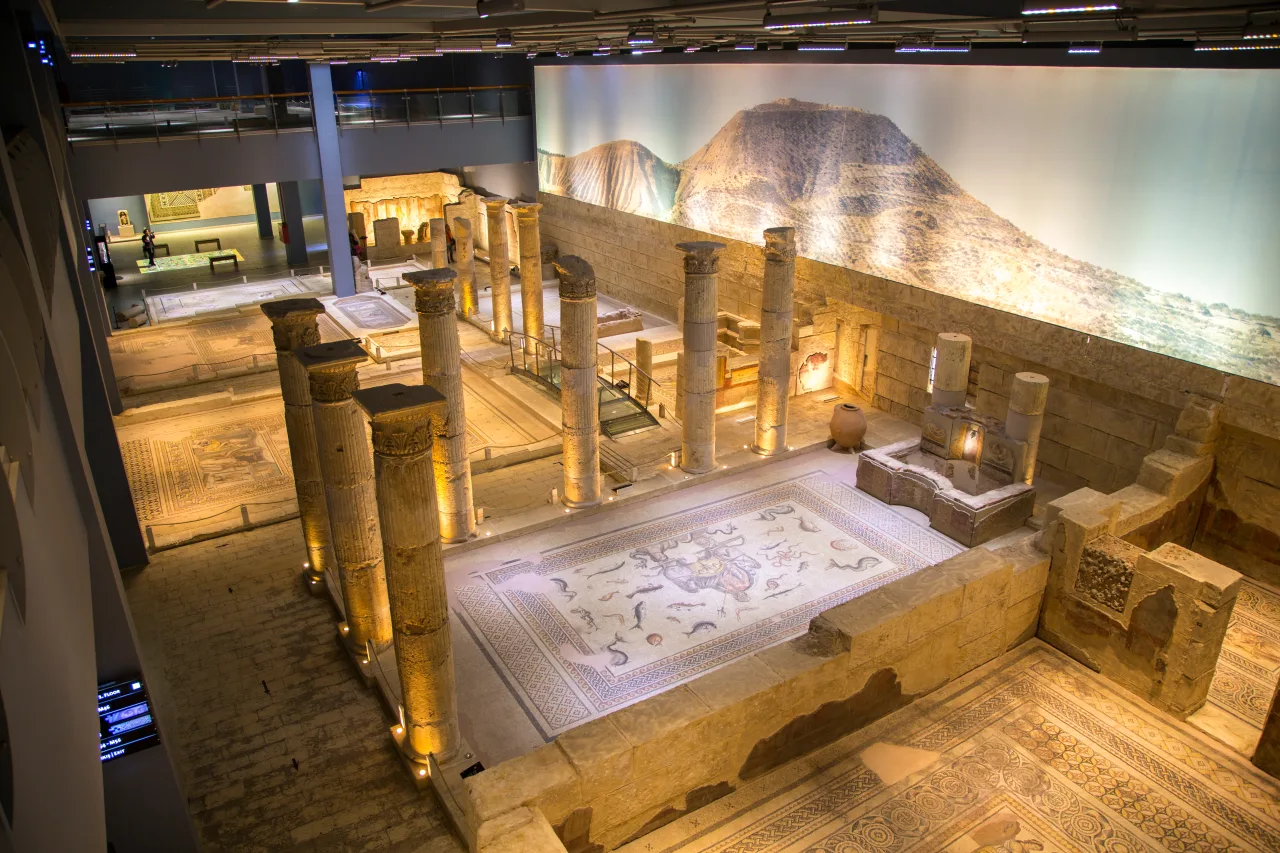 A mosaic display and reconstructed columns at Gaziantep’s Zeugma Museum