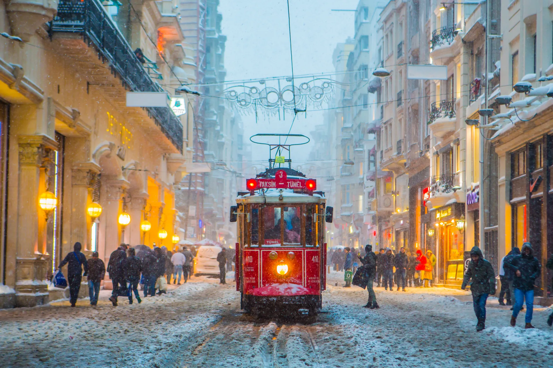 Istanbul’s heritage tram on a snowy Istiklal Street